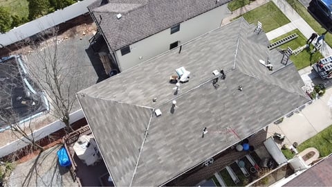 Aerial view: shingle installation in progress