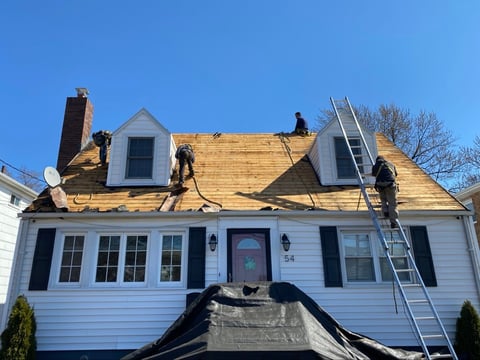 Roof tear-off in progress