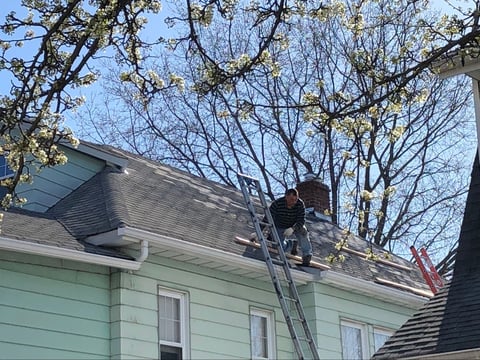 Gutter cleaning in progress