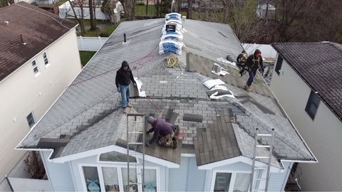 Aerial view: shingle installation in progress