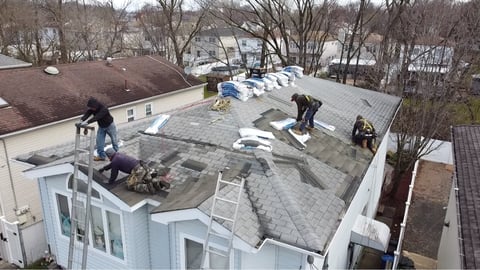 Aerial view: shingle installation in progress